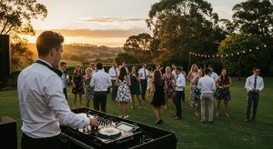 Wedding DJ performing at an outdoor wedding in Bowral with guests dancing